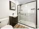 Modern bathroom featuring a glass-enclosed shower and stylish vanity at 2136 W 6Th Ave, Gastonia, NC 28052