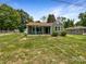 Inviting home with a cozy front porch, green lawn, and ample natural light at 2136 W 6Th Ave, Gastonia, NC 28052