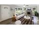Bright living room with fireplace, modern furnishings, and large windows at 2136 W 6Th Ave, Gastonia, NC 28052