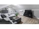 Cozy bonus room featuring a comfortable couch and a bed with stylish accents at 22 Honeysuckle Ln, Clover, SC 29710
