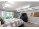 Bright bedroom with large windows, an outdoor view, and neutral decor at 22 Honeysuckle Ln, Clover, SC 29710