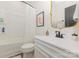 This bathroom offers sleek fixtures, modern lines, and lots of light at 2203 Autumn Olive Ln, Stallings, NC 28104