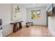 Bright workout room with natural light, minimalist decor, and hardwood floors at 2215 Cortelyou Rd, Charlotte, NC 28211