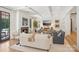 Cozy living room featuring a fireplace, coffered ceiling, and comfortable seating at 2215 Cortelyou Rd, Charlotte, NC 28211