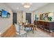 Sophisticated office with hardwood floors, stylish furnishings, and a flat-screen television display at 2215 Cortelyou Rd, Charlotte, NC 28211