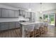 Beautiful kitchen with granite countertops, stylish barstool seating, and modern appliances at 250 Winford Rd, Troutman, NC 28166