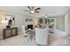 Inviting living room with a fireplace, neutral decor, ceiling fan, and a sliding glass door at 2525 Saddlehorse Ln, Gastonia, NC 28056