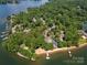 Beautiful lakefront neighborhood offering tranquil living with mature trees, a private beach, and boat docks at 26 New River Trce, Lake Wylie, SC 29710