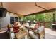 Backyard deck featuring an outdoor seating area with comfortable furnishings and cushions at 26 New River Trce, Lake Wylie, SC 29710