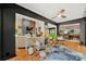 Spacious living room with hardwood floors and an open layout to the dining area and multiple patios at 26 New River Trce, Lake Wylie, SC 29710