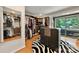 Spacious walk-in closet with custom shelving, drawers, and a vanity, plus a sliding door to a deck at 26 New River Trce, Lake Wylie, SC 29710