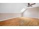 Bedroom with neutral paint, hardwood floors and a skylight for natural lighting at 2695 Queens Rd, Lincolnton, NC 28092