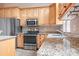 Close up of modern kitchen with granite countertops and stainless steel appliances at 2695 Queens Rd, Lincolnton, NC 28092