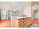 Kitchen island with granite countertops and stainless steel sink at 2695 Queens Rd, Lincolnton, NC 28092