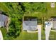 Bird's-eye perspective showcasing the property's well-kept lawn, mature trees, and ample parking space at 2857 Scarborough Ct, Gastonia, NC 28054