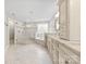 Bright bathroom with a glass shower, soaking tub, and double sinks on marble vanity at 2857 Scarborough Ct, Gastonia, NC 28054