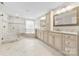 Spacious bathroom with double sinks, a glass shower, and a soaking tub at 2857 Scarborough Ct, Gastonia, NC 28054