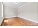 Bedroom with hardwood floors, neutral paint, crown molding and ample natural light at 2857 Scarborough Ct, Gastonia, NC 28054