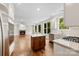 Spacious open concept kitchen with granite countertops, stainless appliances, and eat-in island at 2857 Scarborough Ct, Gastonia, NC 28054