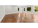 Spacious room featuring hardwood floors, neutral walls, large windows and lots of natural light at 2857 Scarborough Ct, Gastonia, NC 28054