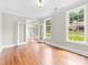 Spacious living room featuring hardwood floors, neutral paint, and ample natural light at 2857 Scarborough Ct, Gastonia, NC 28054
