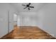 Spacious bedroom featuring hardwood floors, recessed lights, and large closets at 3008 Laney Pond Rd, Matthews, NC 28104