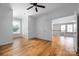 Bonus room with hardwood floors, bright windows, and neutral colored walls at 3008 Laney Pond Rd, Matthews, NC 28104
