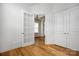 Bright and spacious office with hardwood floors and glass-paneled doors at 3008 Laney Pond Rd, Matthews, NC 28104