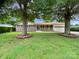 Charming single-story home with a welcoming front porch and mature trees shading the yard at 302 Melinda Ave, Kannapolis, NC 28083
