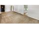 Spacious living room with wall-to-wall carpet and lots of natural light at 302 Melinda Ave, Kannapolis, NC 28083