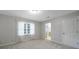 Cozy bedroom with a large window and neutral color scheme at 3800 Lovett Cir, Charlotte, NC 28210