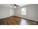 Bedroom with laminate flooring, closet and window at 3800 Lovett Cir, Charlotte, NC 28210