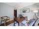 Comfortable office area with a wooden desk, decor, and neutral wall colors at 3800 Lovett Cir, Charlotte, NC 28210