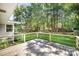 Spacious backyard with wood deck and grass area at 409 Edgewood Ct, Lancaster, SC 29720