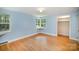 Bedroom with hardwood floors, windows and walk in closet at 409 Edgewood Ct, Lancaster, SC 29720