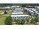 An aerial view of a neighborhood that includes contemporary townhomes, green spaces and new construction at 5006 Tiny Ln, Charlotte, NC 28203
