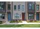 Charming townhome exteriors showcasing architectural details and colorful doors at 5006 Tiny Ln, Charlotte, NC 28203