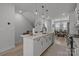 Beautiful kitchen featuring a large island with bar seating, stainless steel appliances, and open floor plan at 5006 Tiny Ln, Charlotte, NC 28203
