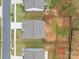 Aerial view of backyard with wooden privacy fence and large cleared grassy space at 5314 Upton Pl, Charlotte, NC 28215