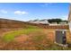 Backyard enclosed by a wooden fence, with an AC unit near the house at 5314 Upton Pl, Charlotte, NC 28215