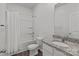Classic bathroom design features white cabinets, granite counters, a tub and shower combo, and a toilet at 5314 Upton Pl, Charlotte, NC 28215