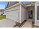 Charming home exterior featuring a two-car garage and front entrance at 5314 Upton Pl, Charlotte, NC 28215