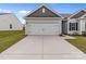 Close-up of the home's garage and driveway at 5314 Upton Pl, Charlotte, NC 28215