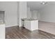 Kitchen island with stainless steel appliances and granite countertops at 5314 Upton Pl, Charlotte, NC 28215
