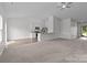 Expansive living room featuring an eat-in kitchen area, ideal for modern living and entertaining at 5314 Upton Pl, Charlotte, NC 28215