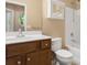 Bathroom features a single sink vanity with wood cabinets and shower-tub combination at 56119 Finches Ct, Indian Land, SC 29707
