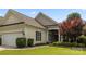 Charming home with manicured lawn, lush landscaping, and a two-car garage at 56119 Finches Ct, Indian Land, SC 29707