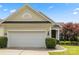 Attached two car garage is surrounded by manicured landscaping at 56119 Finches Ct, Indian Land, SC 29707