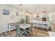 Open-concept: dining room with kitchen views provides a modern living experience at 635 R L Stowe Rd, Belmont, NC 28012