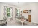 Comfortable home office with natural light, built-in shelving, a desk, and neutral decor at 635 R L Stowe Rd, Belmont, NC 28012